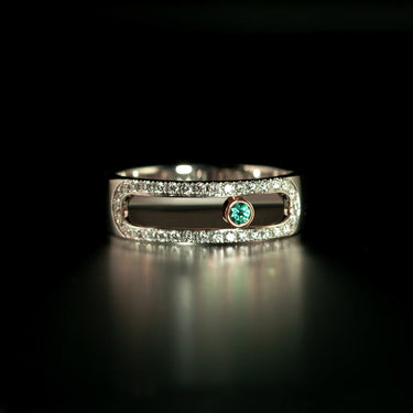0.05ct natural alexandrite ring with moving bezel set in 18k white and rose gold accented with diamonds